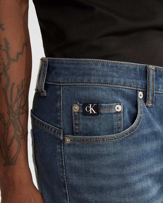 ULTIMATE STRETCH BODY TAPER JEANS