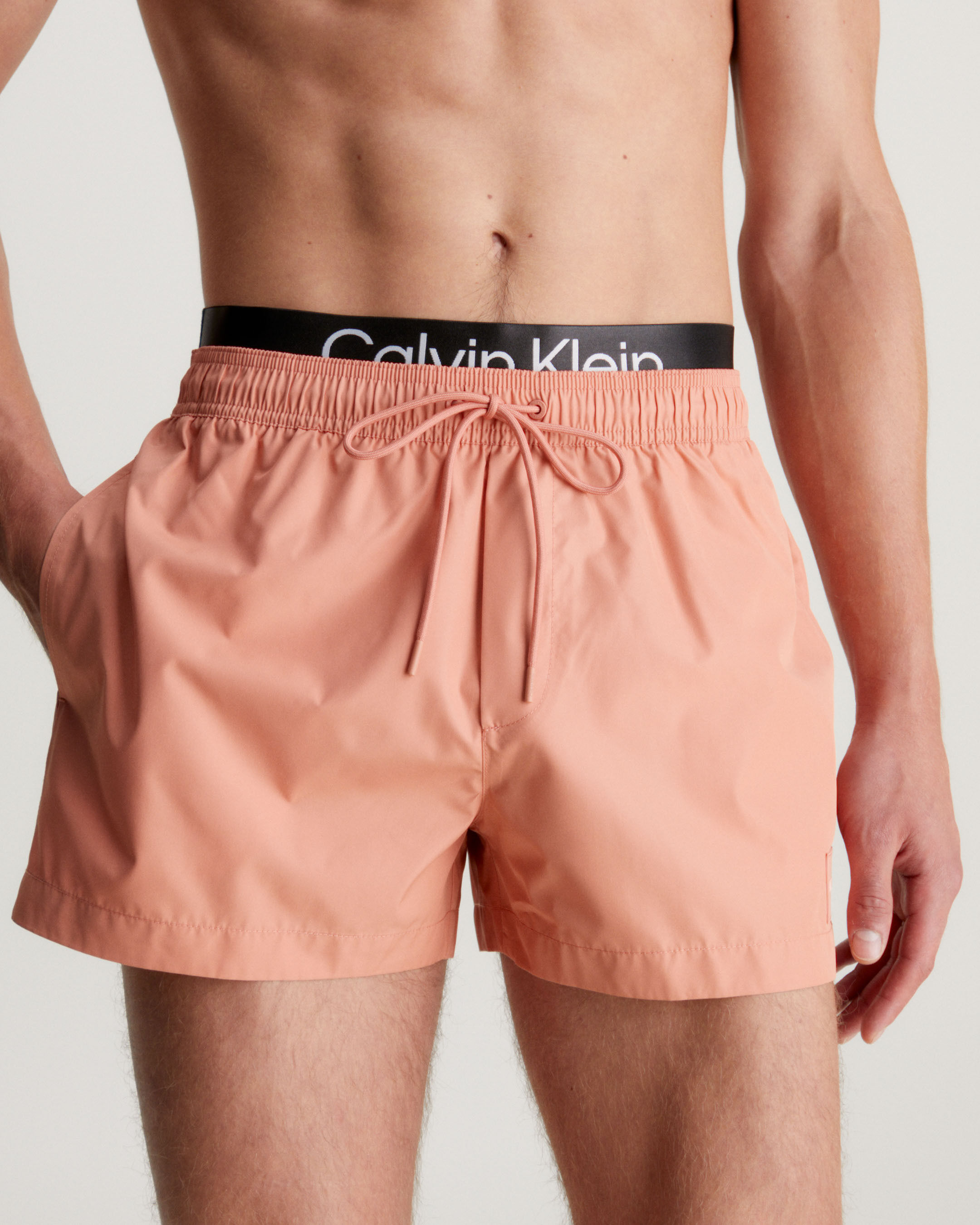 Pink calvin klein swim shorts discount