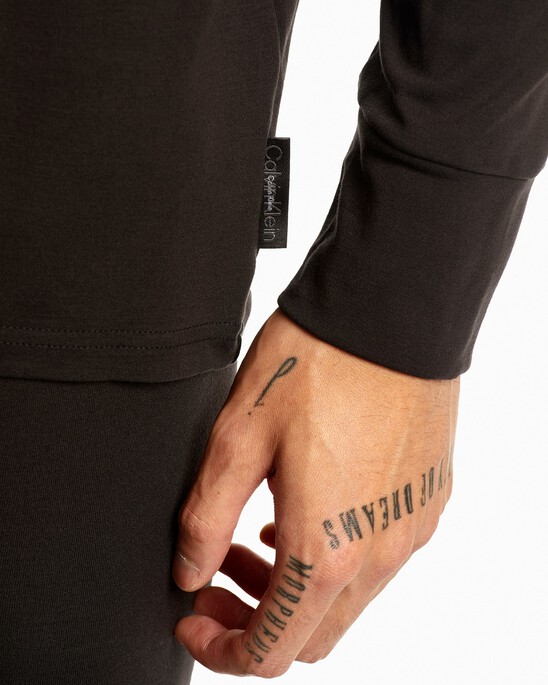 EMBOSSED ICON CREW NECK TOP