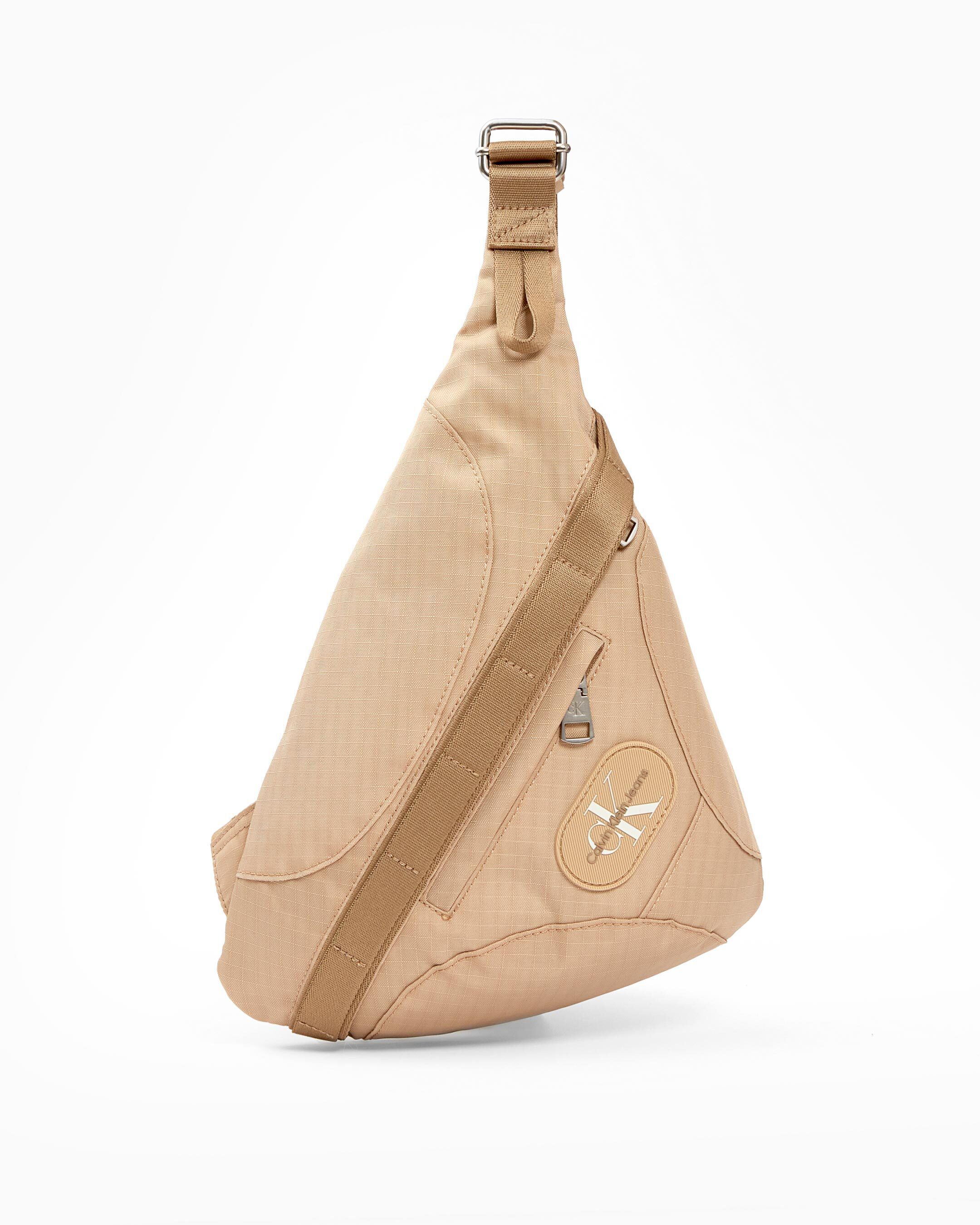 Metaforms Rounded Crossbody Sling brown Calvin Klein Malaysia