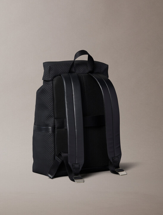 Embossed Woven Flap Backpack