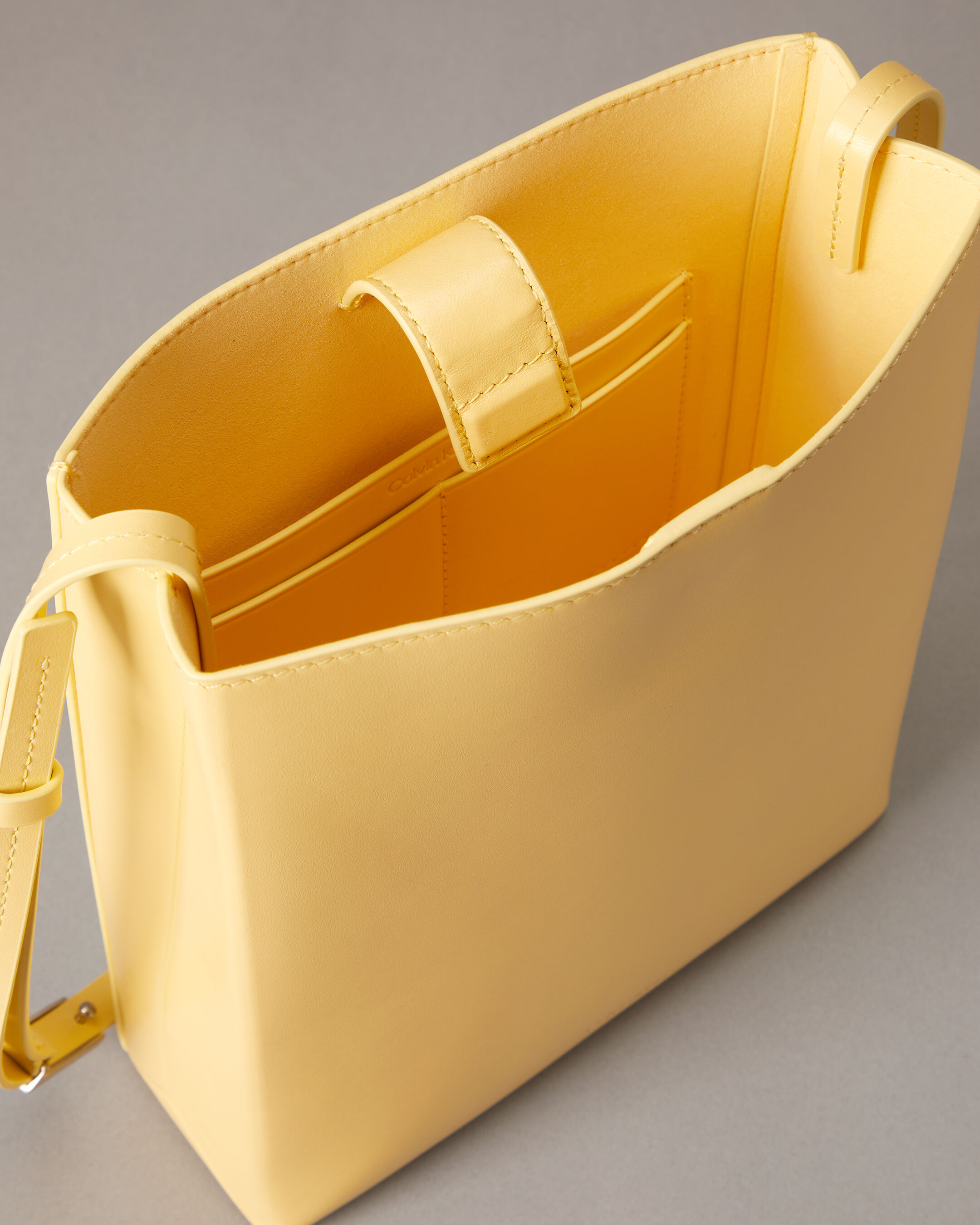 CK Paper Bag Leather Crossbody | yellow | Calvin Klein Malaysia