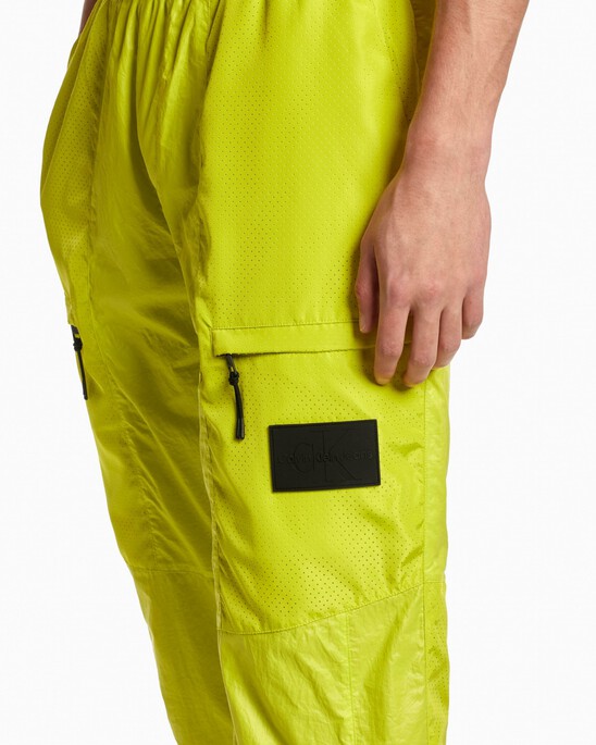 REIMAGINE NATURE PERFORATED CARGO PANTS