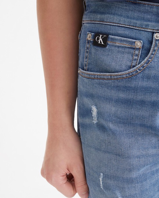 37.5 DISTRESSED MODERN TAPER JEANS