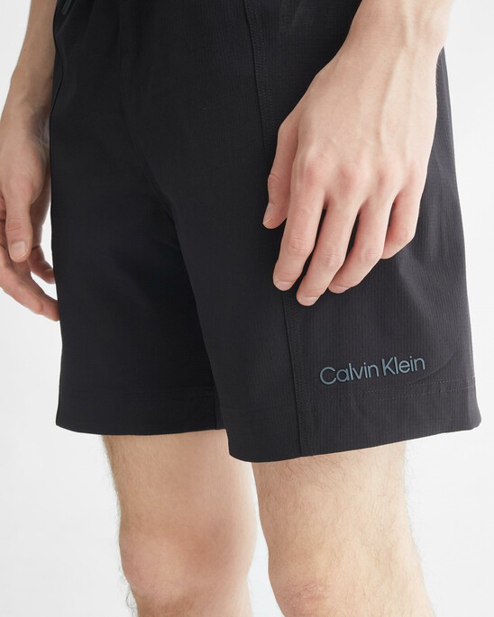 ESSENTIALS WOVEN SHORTS