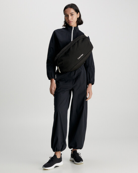 CK ATHLETIC SLING BAG XL