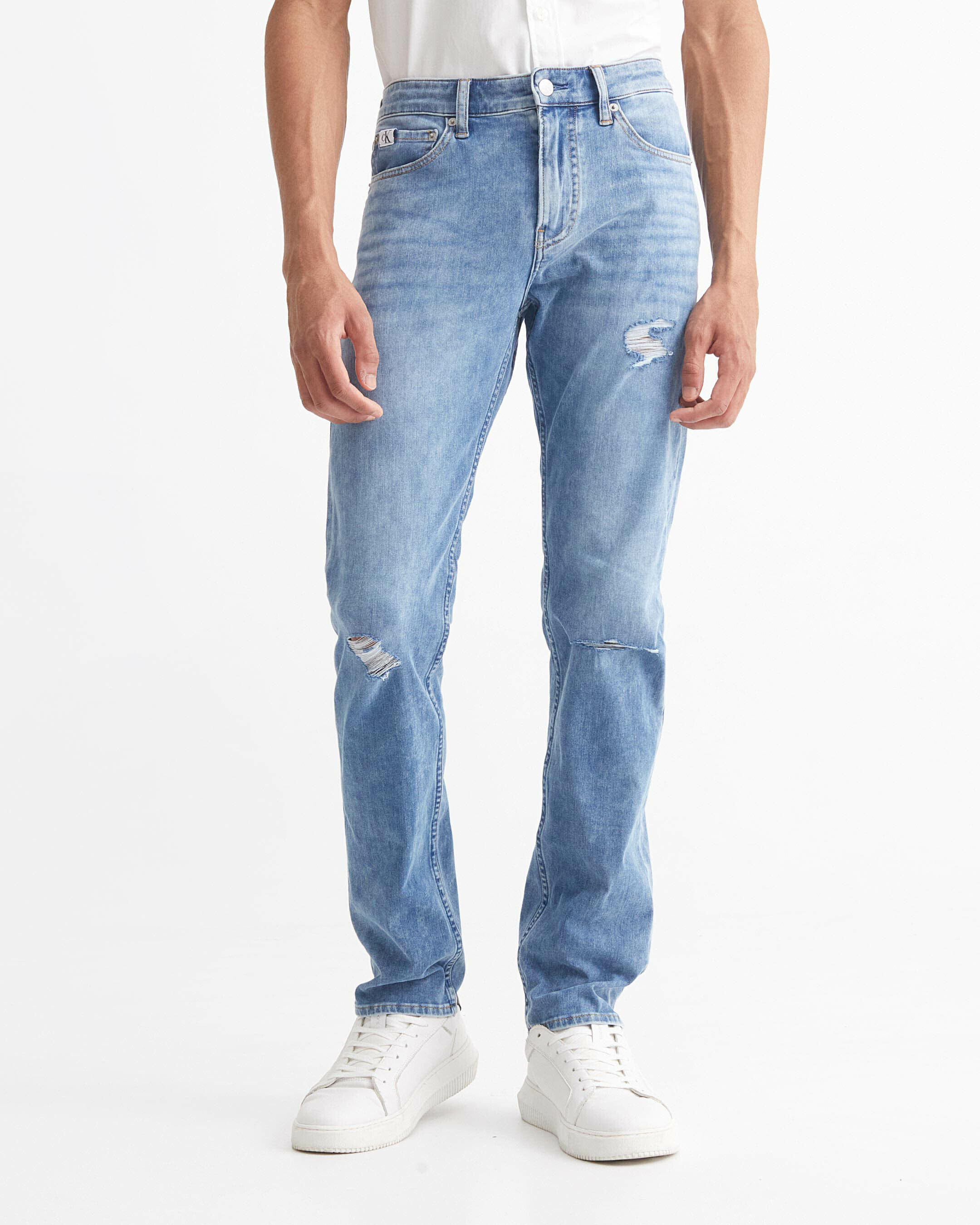 Calvin klein distressed jeans sales